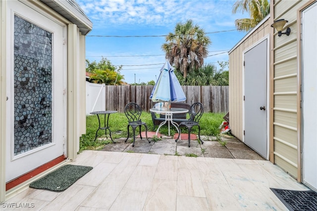 4617 Lombardy Ln, Naples, FL 34112 - view of patio with a fenced backyard