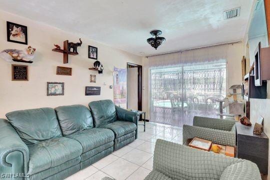 5251 Boxwood Way, Naples, FL 34116 - living area with light tile patterned floors