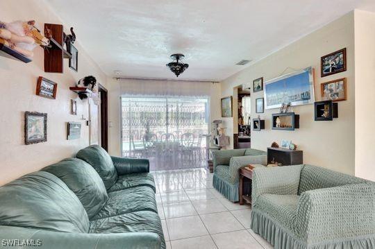 5251 Boxwood Way, Naples, FL 34116 - view of tiled living room