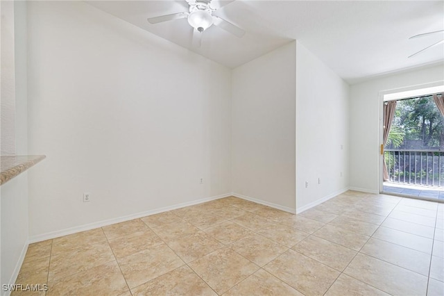 20273 Royal Villagio Ct Unit 204, Estero, FL 33928 - unfurnished room with lofted ceiling, a ceiling fan, light tile patterned floors, and baseboards