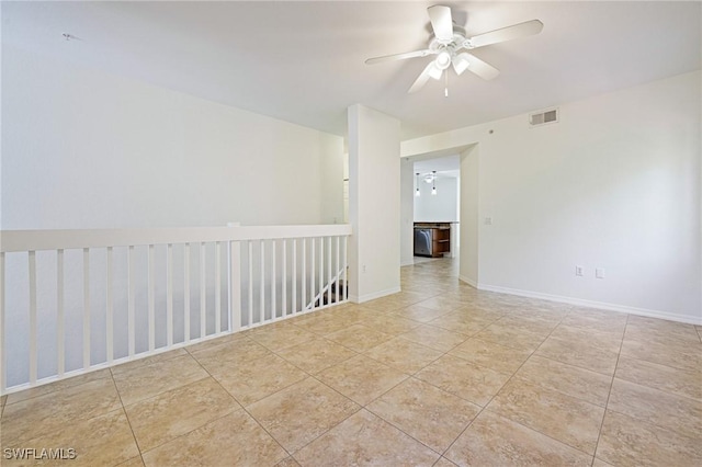 20273 Royal Villagio Ct Unit 204, Estero, FL 33928 - empty room featuring a ceiling fan, tile patterned flooring, and baseboards