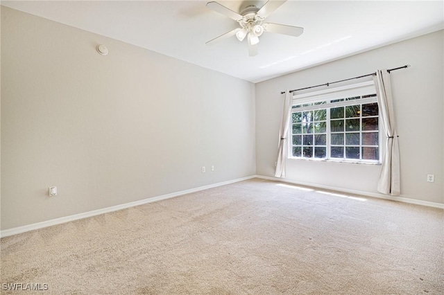 20273 Royal Villagio Ct Unit 204, Estero, FL 33928 - carpeted empty room featuring a ceiling fan, baseboards, and a smoke detector
