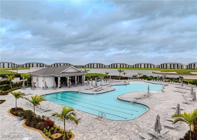 5416 Double Eagle Cir Unit 2327, Ave Maria, FL 34142 - community pool with a patio area