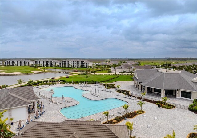 5416 Double Eagle Cir Unit 2327, Ave Maria, FL 34142 - community pool featuring a patio