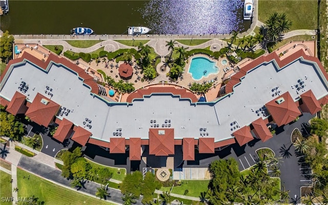 5704 Cape Harbour Dr Unit 105, Cape Coral, FL 33914 - drone / aerial view of a pool area