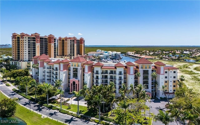 5704 Cape Harbour Dr Unit 105, Cape Coral, FL 33914 - view of apartment building / complex with a water view
