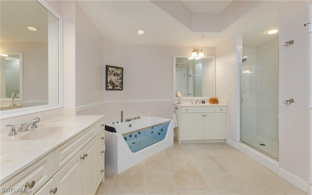 5704 Cape Harbour Dr Unit 105, Cape Coral, FL 33914 - bathroom with two vanities, a tub, a shower stall, and tile patterned floors