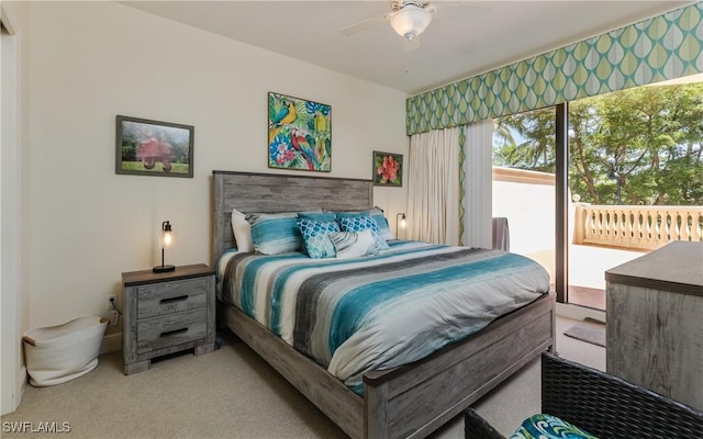 5704 Cape Harbour Dr Unit 105, Cape Coral, FL 33914 - bedroom with access to exterior, light colored carpet, and ceiling fan