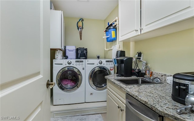 5704 Cape Harbour Dr Unit 105, Cape Coral, FL 33914 - washroom featuring cabinet space and washing machine and dryer