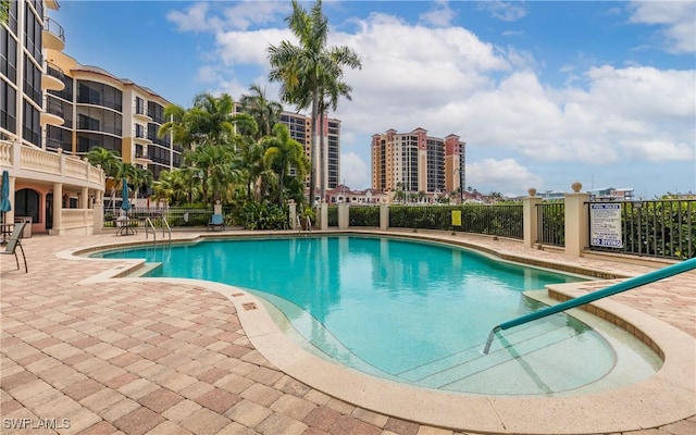 5704 Cape Harbour Dr Unit 105, Cape Coral, FL 33914 - community pool with a patio