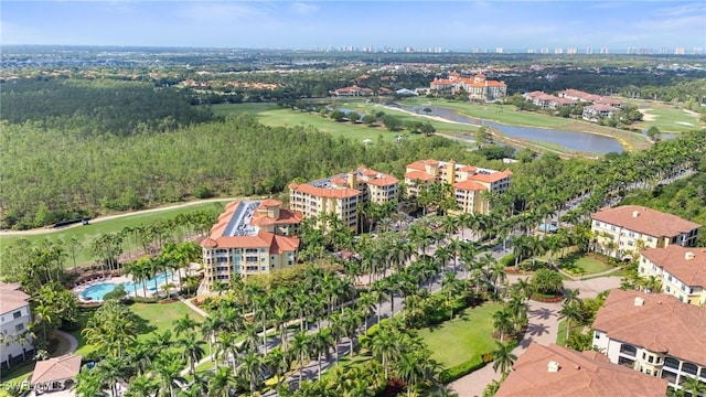 2728 Tiburon Blvd E Unit A104, Naples, FL 34109 - aerial view of property and surrounding area with apartment complex / building, a golf club, and a nearby body of water