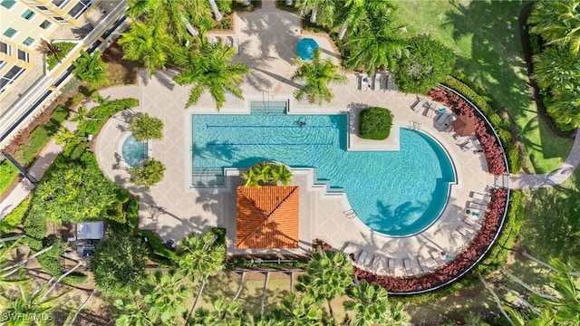 2728 Tiburon Blvd E Unit A104, Naples, FL 34109 - drone / aerial view of a pool