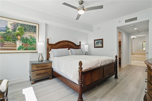 2728 Tiburon Blvd E Unit A104, Naples, FL 34109 - bedroom with crown molding, light wood finished floors, baseboards, and ceiling fan