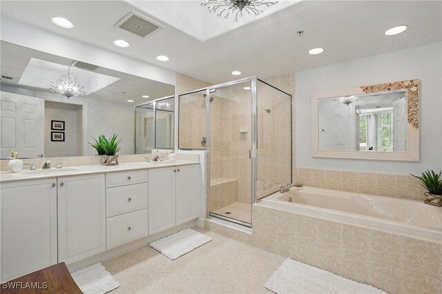 2728 Tiburon Blvd E Unit A104, Naples, FL 34109 - bathroom featuring a shower stall, a bath, tile patterned flooring, recessed lighting, and double vanity