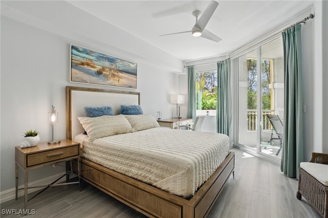2728 Tiburon Blvd E Unit A104, Naples, FL 34109 - bedroom featuring access to exterior, wood finished floors, and a ceiling fan