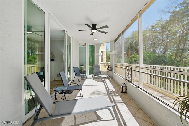 2728 Tiburon Blvd E Unit A104, Naples, FL 34109 - sunroom featuring a ceiling fan