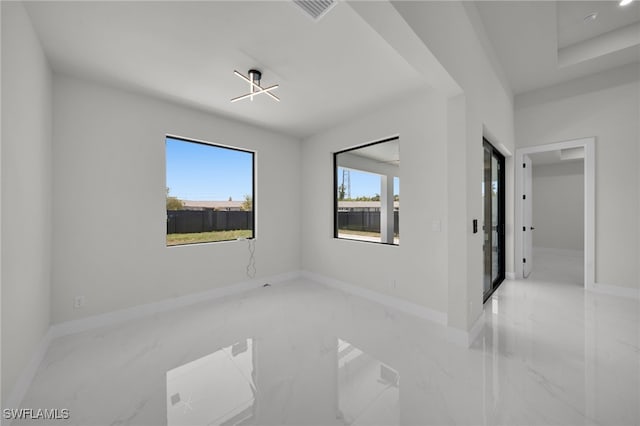 373 El Dorado Blvd S, Cape Coral, FL 33991 - spare room with marble tiled flooring and baseboards