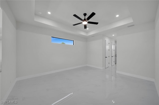 373 El Dorado Blvd S, Cape Coral, FL 33991 - spare room with marble finish floors, recessed lighting, a raised ceiling, baseboards, and a ceiling fan