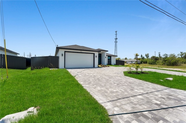 373 El Dorado Blvd S, Cape Coral, FL 33991 - view of front of property featuring a garage, decorative driveway, and stucco siding