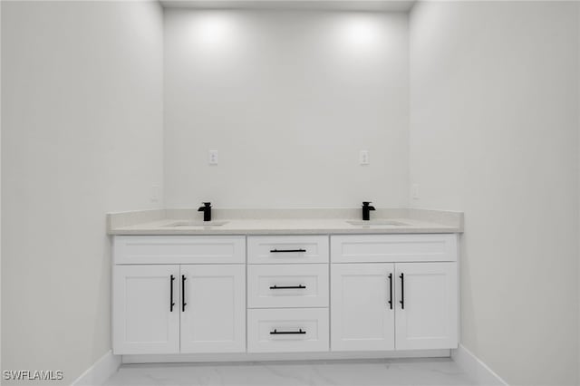 373 El Dorado Blvd S, Cape Coral, FL 33991 - full bath featuring marble look tiles, baseboards, and double vanity