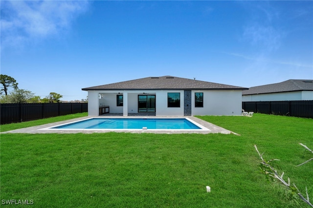 373 El Dorado Blvd S, Cape Coral, FL 33991 - back of property with stucco siding and a patio area
