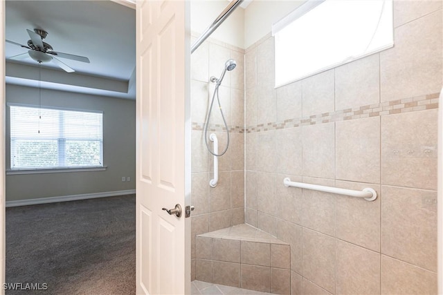 3905 Dunnster Ct, Fort Myers, FL 33916 - bathroom with tiled shower, a ceiling fan, and baseboards
