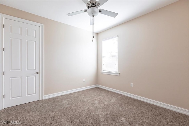 3905 Dunnster Ct, Fort Myers, FL 33916 - empty room with carpet floors, baseboards, and a ceiling fan