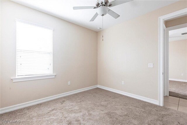 3905 Dunnster Ct, Fort Myers, FL 33916 - spare room with carpet flooring, ceiling fan, and baseboards