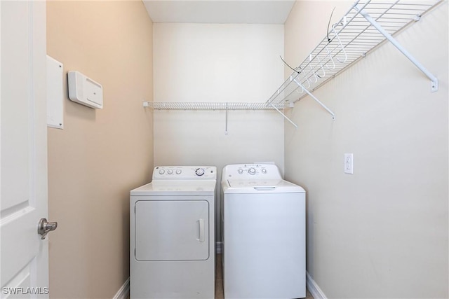 3905 Dunnster Ct, Fort Myers, FL 33916 - laundry area with washing machine and clothes dryer