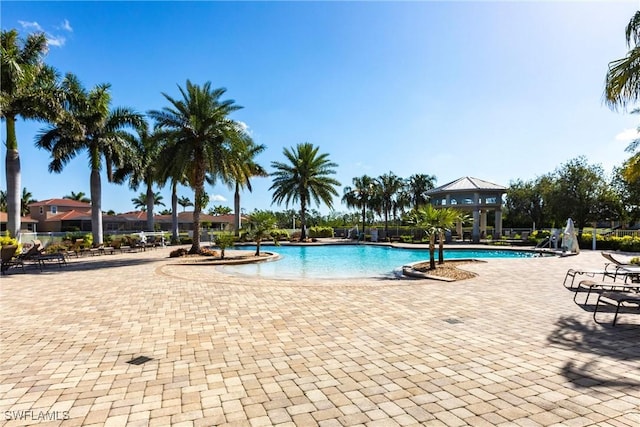 3905 Dunnster Ct, Fort Myers, FL 33916 - community pool with a patio and a gazebo