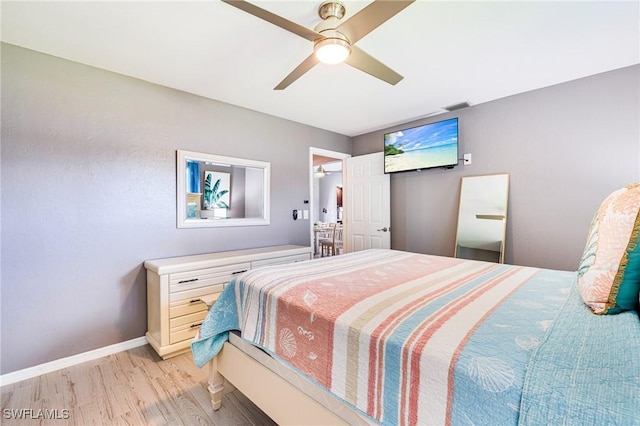 305 SW 8th St, Cape Coral, FL 33991 - bedroom featuring light wood-style flooring, baseboards, and ceiling fan
