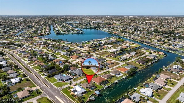 305 SW 8th St, Cape Coral, FL 33991 - aerial view of property and surrounding area with nearby suburban area and a nearby body of water