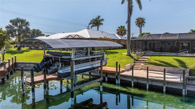 305 SW 8th St, Cape Coral, FL 33991 - dock with boat lift and a lawn