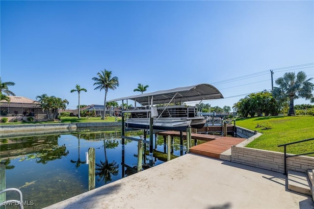 305 SW 8th St, Cape Coral, FL 33991 - dock area featuring boat lift, a water view, and a yard