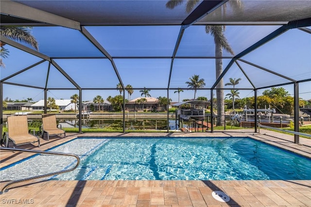 305 SW 8th St, Cape Coral, FL 33991 - swimming pool featuring a patio and glass enclosure