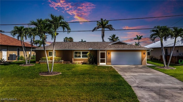 305 SW 8th St, Cape Coral, FL 33991 - ranch-style house featuring stucco siding, an attached garage, a front yard, and driveway