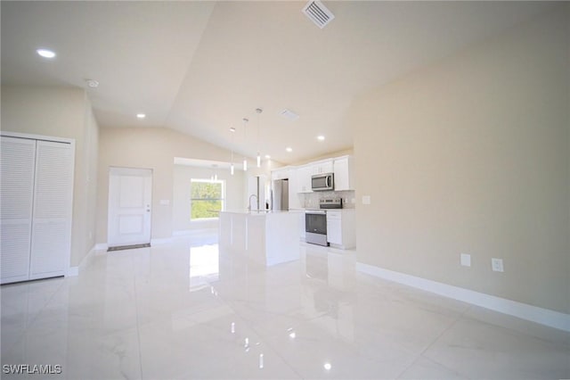 1962 Leghorn St, Lehigh Acres, FL 33972 - unfurnished living room featuring lofted ceiling, recessed lighting, baseboards, and a sink