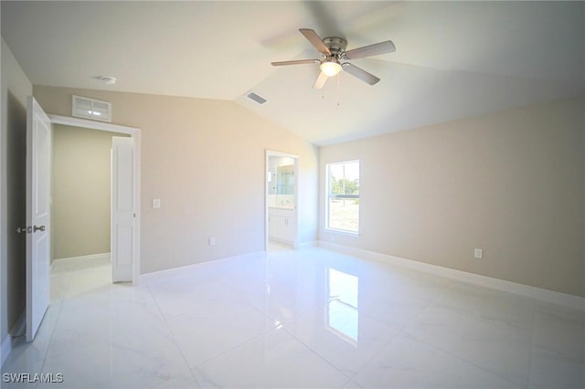 1962 Leghorn St, Lehigh Acres, FL 33972 - empty room with vaulted ceiling, ceiling fan, and baseboards