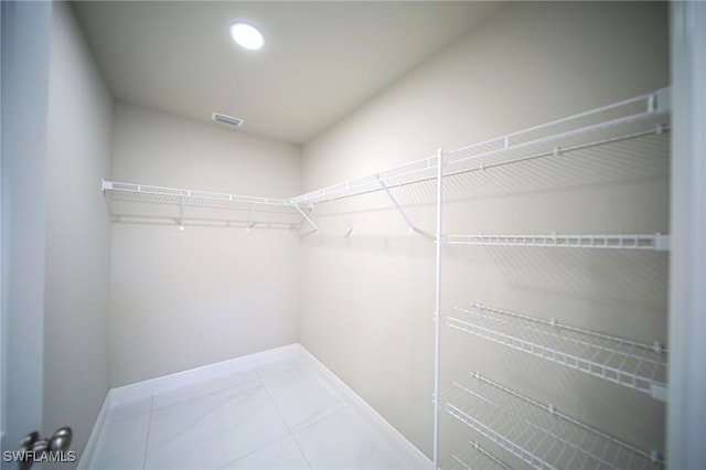 1962 Leghorn St, Lehigh Acres, FL 33972 - spacious closet with marble finish flooring