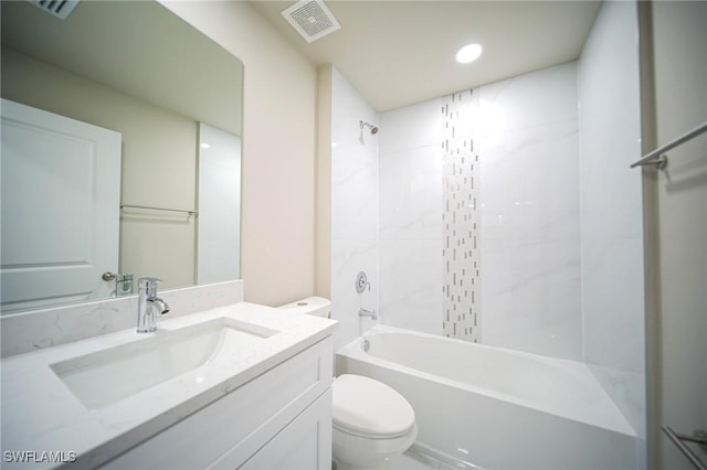 1962 Leghorn St, Lehigh Acres, FL 33972 - bathroom featuring toilet, tub / shower combination, and vanity