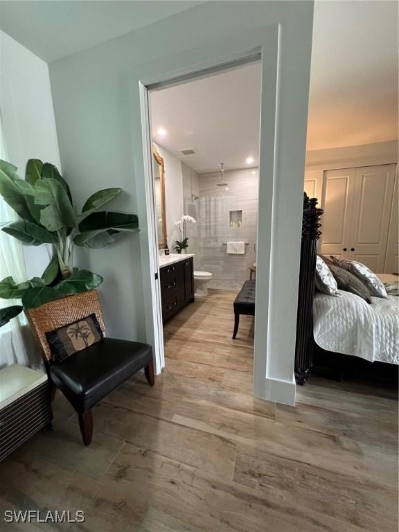 548 5th Ave, Marco Island, FL 34145 - hallway with light wood-style flooring