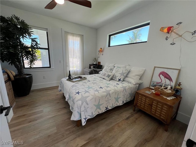 548 5th Ave, Marco Island, FL 34145 - bedroom with wood finished floors, baseboards, and ceiling fan