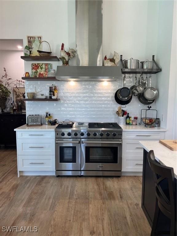 548 5th Ave, Marco Island, FL 34145 - kitchen featuring double oven range, exhaust hood, open shelves, and white cabinets