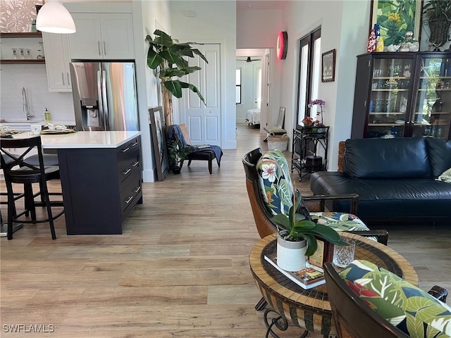 548 5th Ave, Marco Island, FL 34145 - living area featuring light wood-style flooring