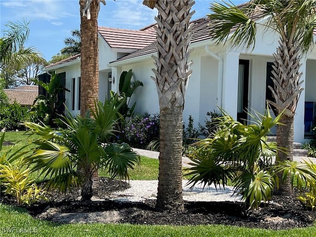 548 5th Ave, Marco Island, FL 34145 - view of property exterior featuring stucco siding
