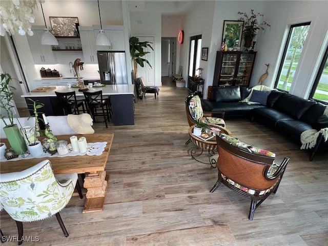 548 5th Ave, Marco Island, FL 34145 - living room featuring light wood-type flooring