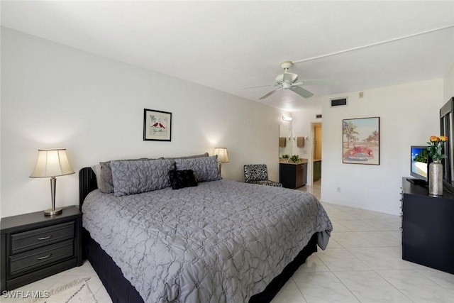 129 S Collier Blvd Unit B-206, Marco Island, FL 34145 - bedroom with light tile patterned flooring and a ceiling fan
