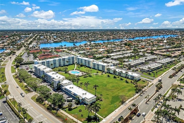 129 S Collier Blvd Unit B-206, Marco Island, FL 34145 - bird's eye view of a large body of water and apartment complex / building