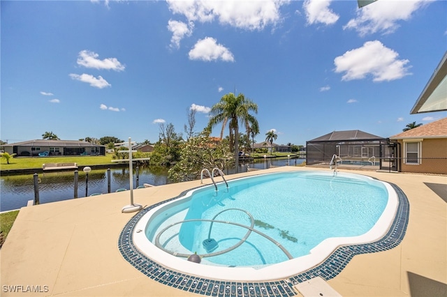 132 SW 34th Ln, Cape Coral, FL 33914 - outdoor pool featuring a water view