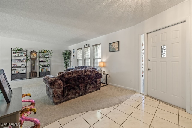 132 SW 34th Ln, Cape Coral, FL 33914 - living area featuring light colored carpet, a textured ceiling, and light tile patterned floors